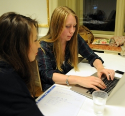 Assel Biyeva from Kazakhstan and Kristina Zakurdaeva from Czech Republic discuss a hypothetical editorial and what information they would need to write it well. Both are seniors in journalism at Anglo-American University in Prague.