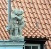 This little couple adorns the roof near my office window.